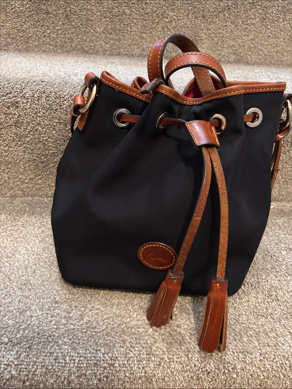 Dooney & Bourke Black Nylon Drawstring Bucket Bag with Brown Leather Trim